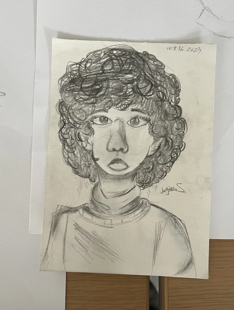 A self portrait of Jayden, drawn with pencil on paper